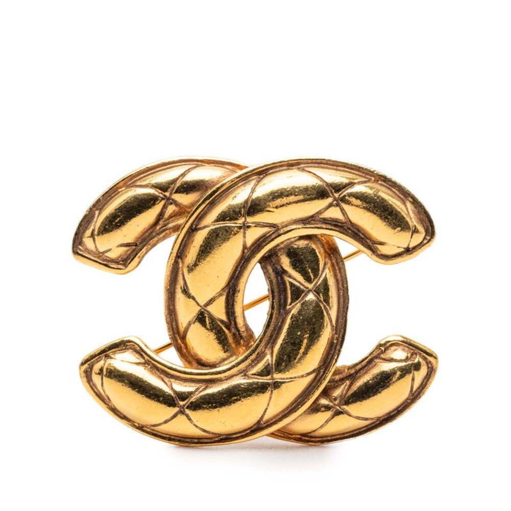CHANEL Gold Logo Brooch